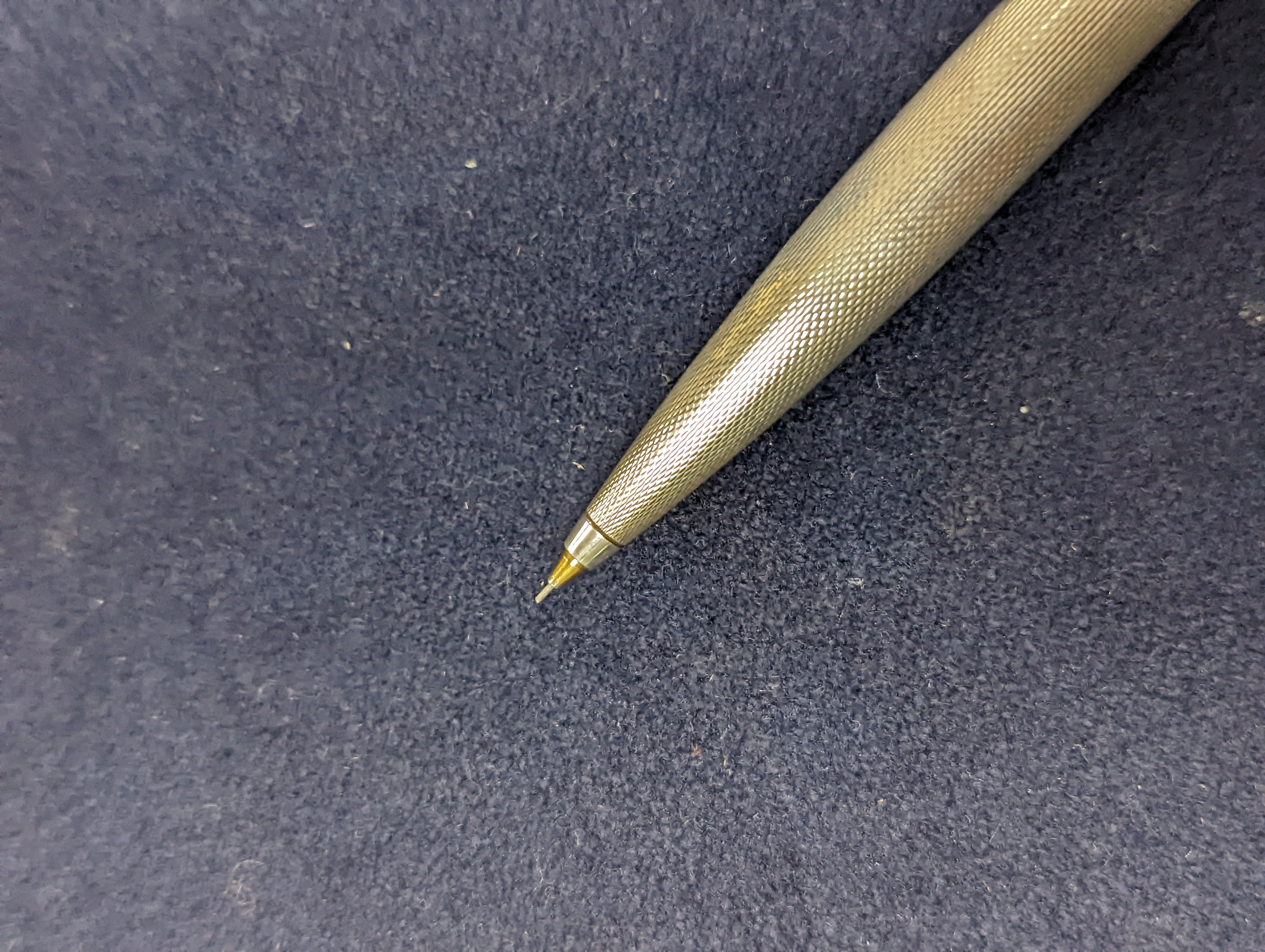 A modern suite of three silver Montblanc Meisterstuck ballpoint pens and pencil